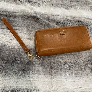 Rachel Cruz brown, distressed, leather wallet with detachable wrist strap.